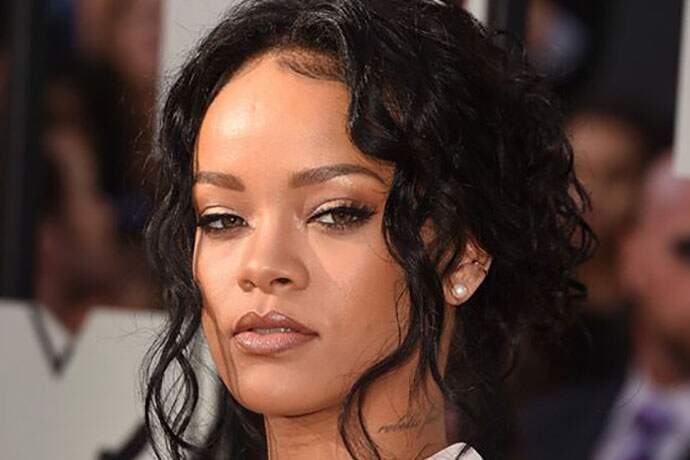 Homem critica testa de Rihanna e cantora rebate comentário