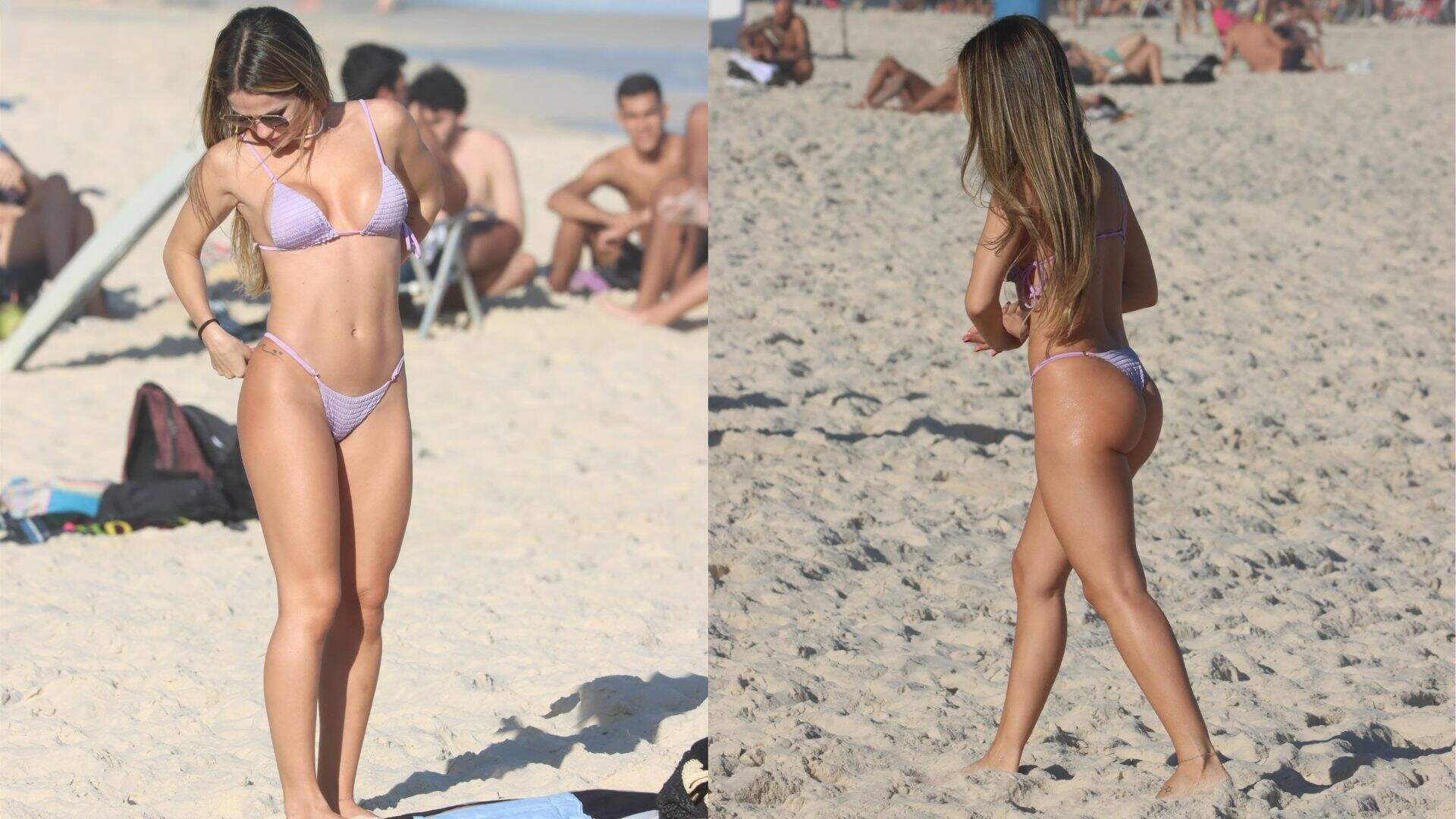 Carla Bruno andando na praia