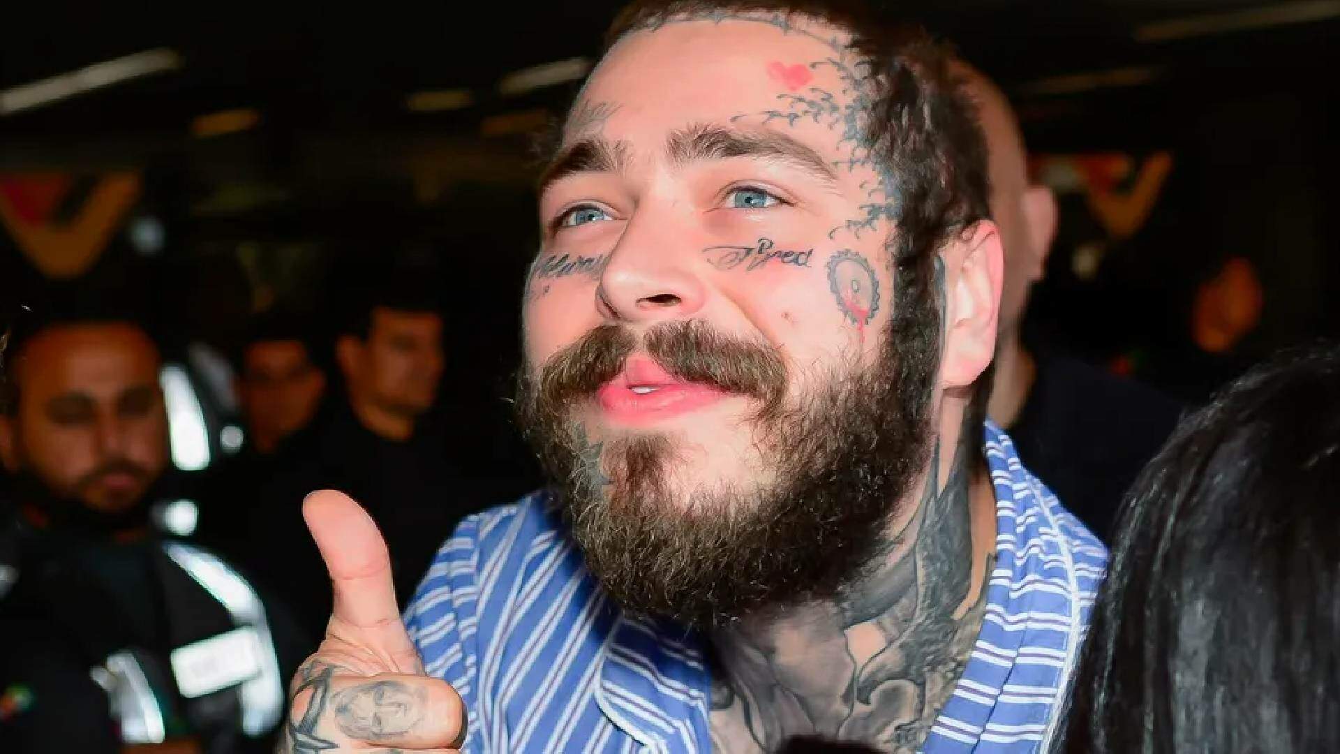 Post Malone desembarca no Brasil, tem atitude inesperada com fãs em aeroporto e é aclamado - Metropolitana FM